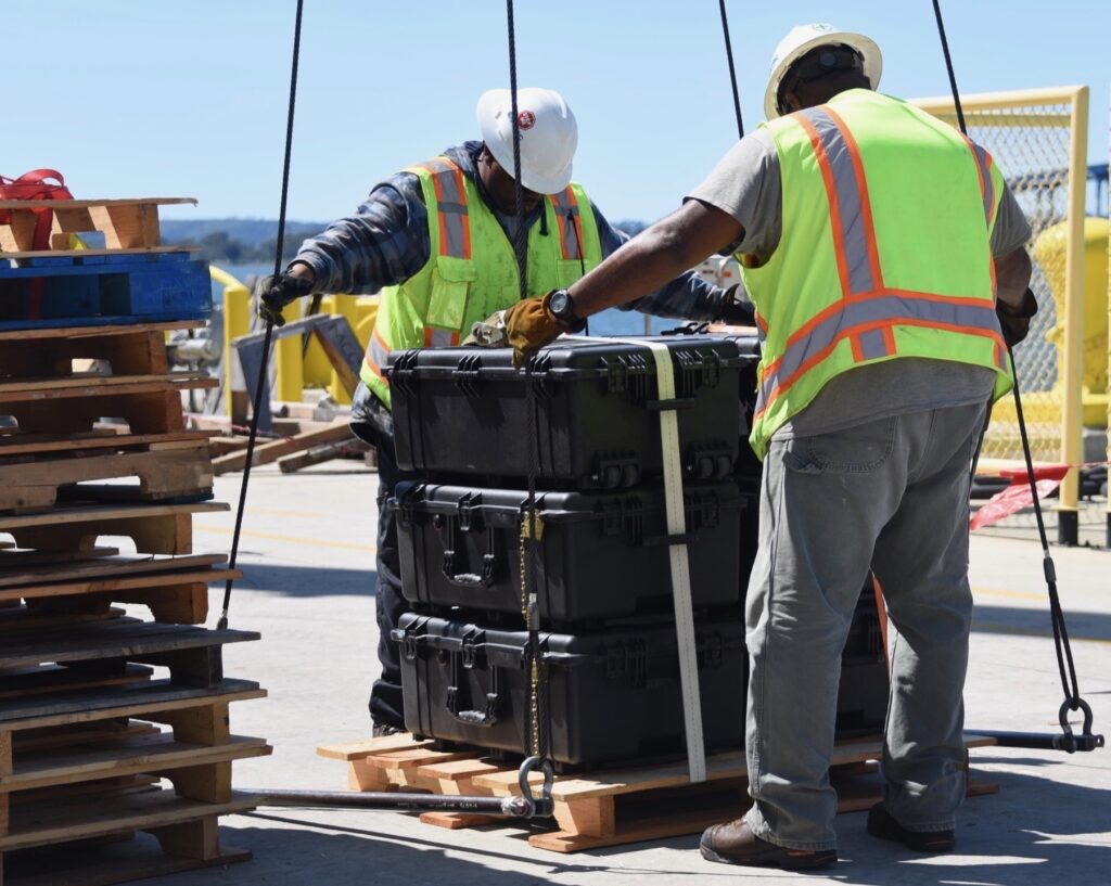 items stacked on a pallet ready for delivery by courier